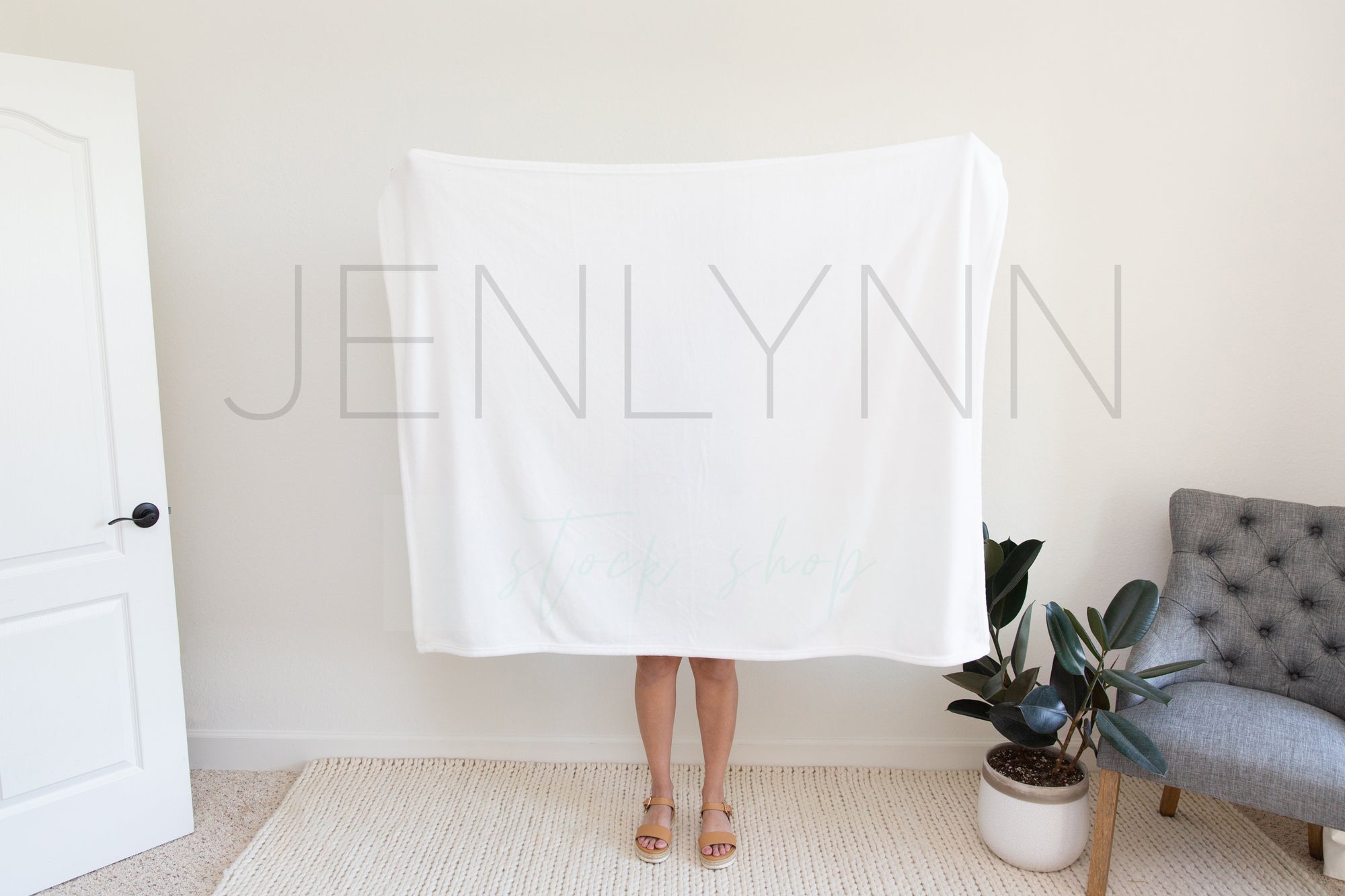 Woman Holding 50x60 Minky Blanket Mockup #1 PSD