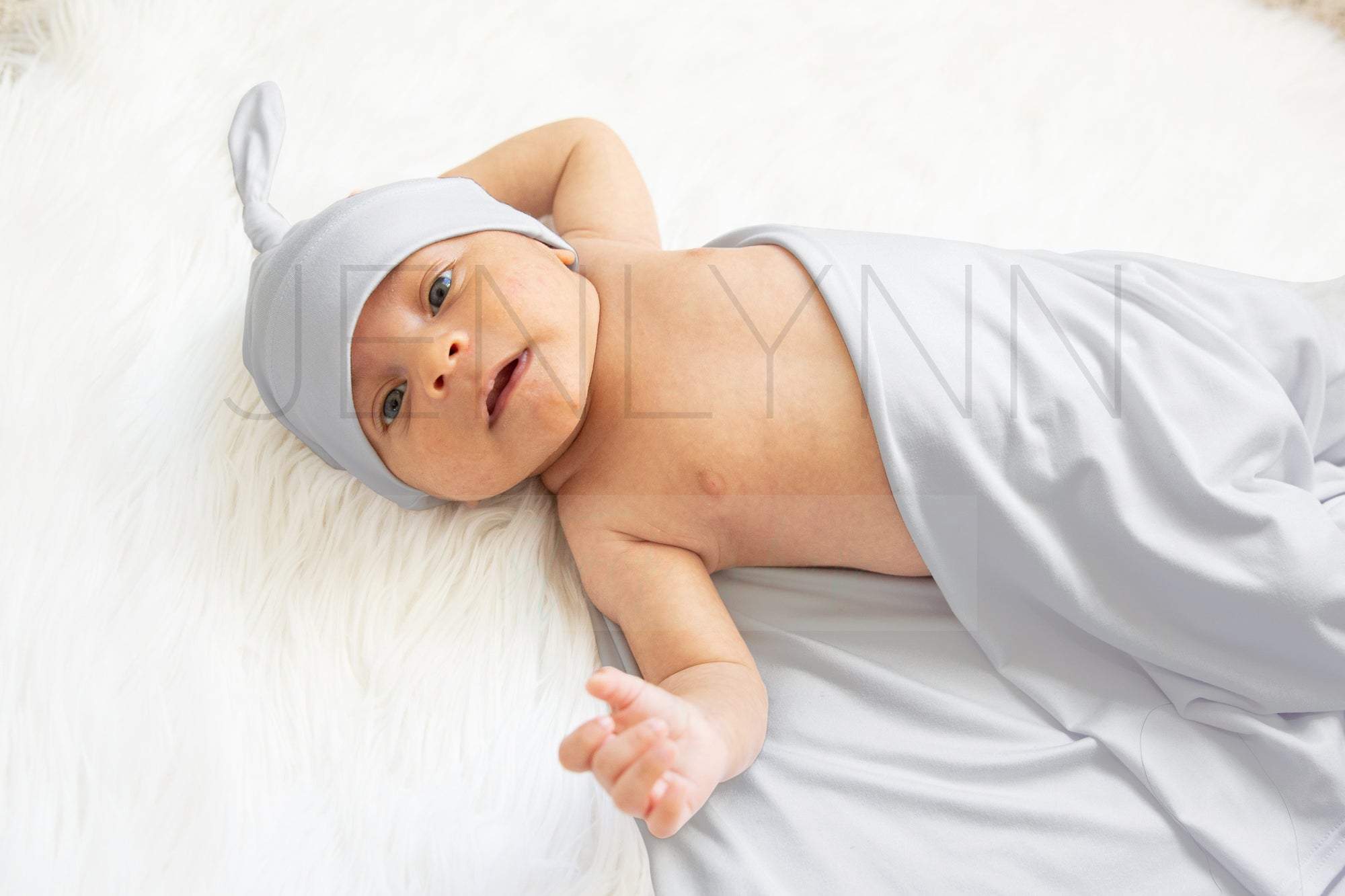 Stretch Jersey Blanket with knotted hat on baby Mockup #BL10 PSD