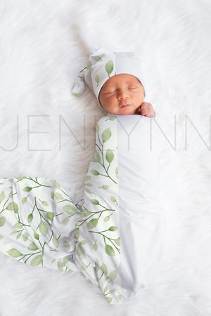 Stretch Jersey Blanket with knotted hat on baby Mockup #JZ13 PSD