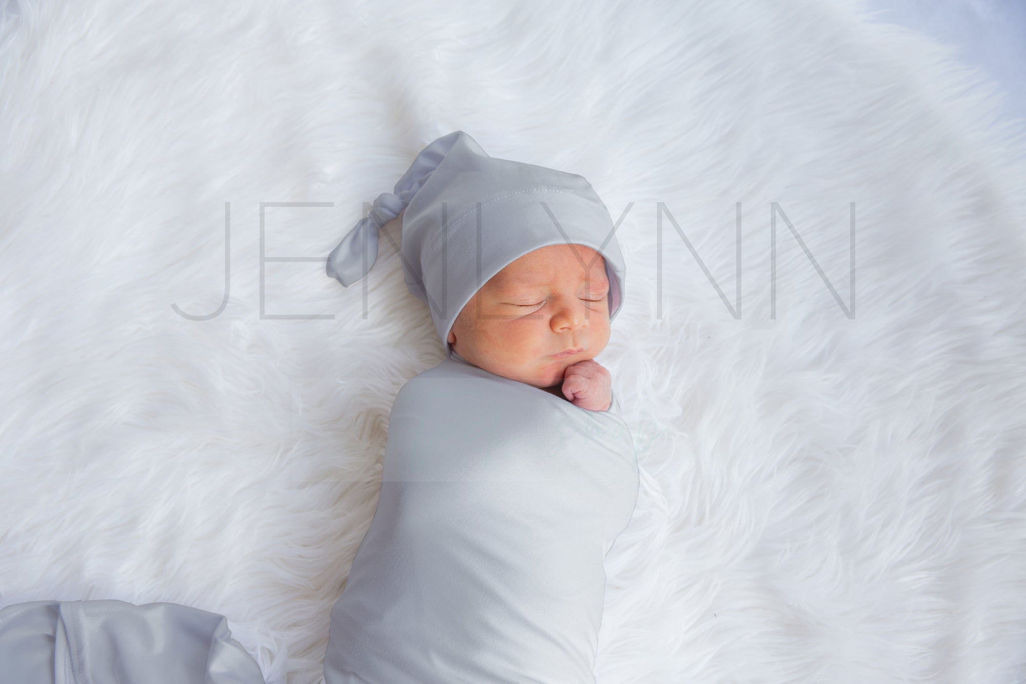 Stretch Jersey Blanket with knotted hat on baby Mockup #JZ16 PSD
